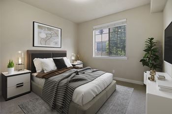 A bedroom with a large bed, a nightstand with a plant, and a window with a view of trees.